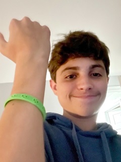 Ayden showing bracelet